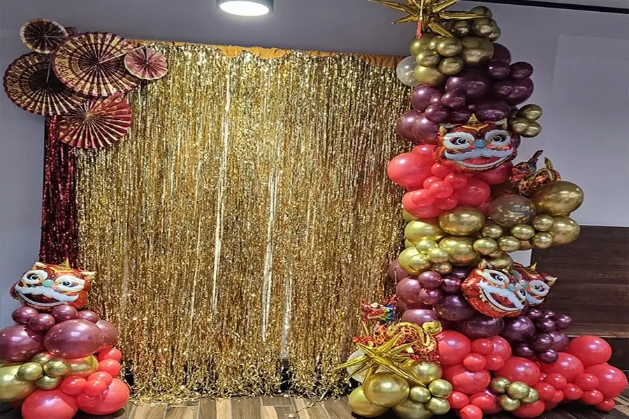 Custom backdrop with balloon décor in Kansas City event space